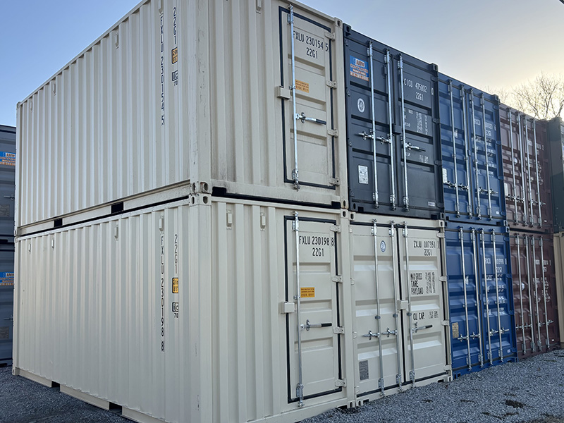 Stacked shipping containers for sale and rent to be used for storage or offices.