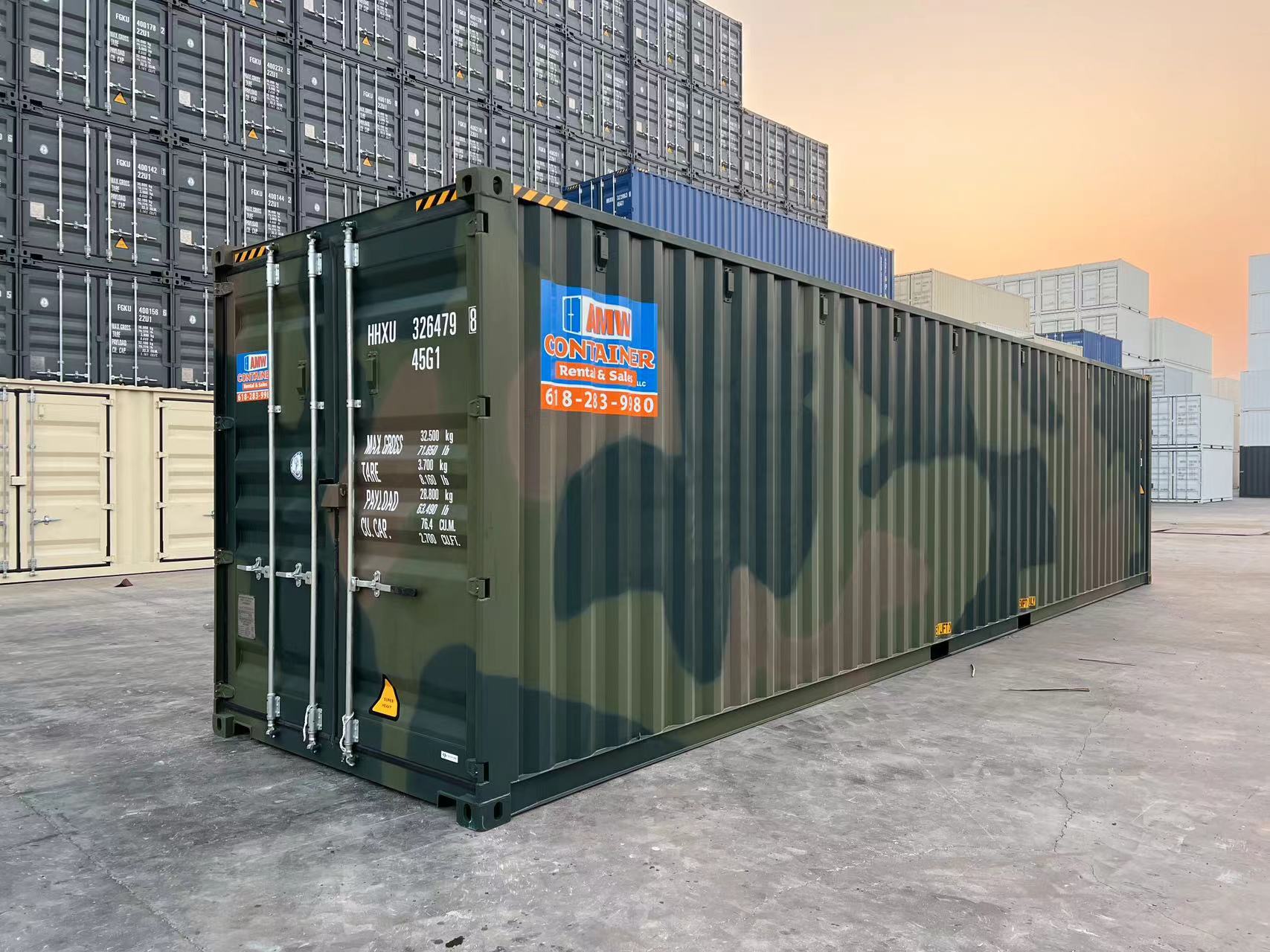 Green one trip shipping container from AMW Container Sales and Rentals at a container yard.